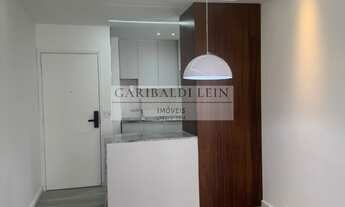 Imagem 2: 2 dormitórios, 1 suítes, 2 banheiro, 1 vaga na garagem, 67M² de Área Construída