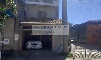 Imagem: 3 dormitórios, 2 banheiro, 2 vagas na garagem