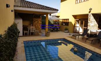 Imagem 2: Excelente Casa de Condomínio aceita permuta com 4 dts, sendo 4suítes quintal, piscina,chu