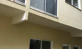 Imagem 2: Casa com 2 dormitórios, sala, cozinha, banheiro e garagem. Em dois irmãos Nova Iguaçu