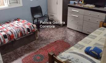 Imagem 7: Casa ampla com quintal amplo. Possui 4 quartos sendo 1 com suíte e 3 vagas de garagem cobe