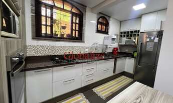 Imagem 6: Lindo Sobrado à venda com 3 Suítes, 2 Vagas e Churrasqueira no Bairro do Boqueirão em Sant