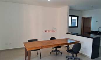 Imagem 2: Casa sobreposta alta em Santos no bairro da Aparecida com varanda de frente na sala, 2 suí