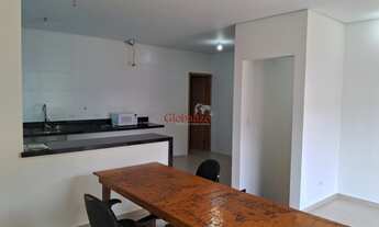 Imagem 3: Casa sobreposta alta em Santos no bairro da Aparecida com varanda de frente na sala, 2 suí