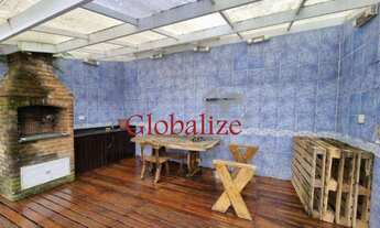 Imagem 4: Triplex no Embaré com 5 dormitórios sendo 3 suítes 5 banheiros piscina churrasqueira e dua