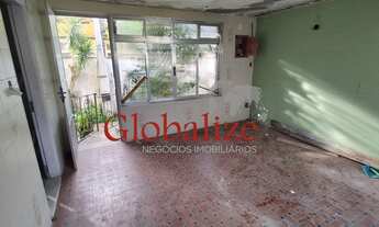 Imagem 2: Casa com quintal para reforma à venda no bairro do Estuário em Santos por R$ 650.000,00