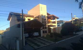 Imagem 2: Casa Sobrado / 4 dormitórios sendo 3 Suítes / Condomínio Residencial Coleginho / Piscina