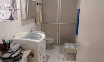 Imagem 6: Venda Apartamento Sala Living Santo SP - mAr dOce lAr em andar alto no edifício Genebra na