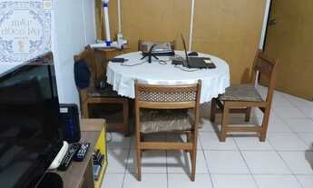 Imagem 3: Venda Apartamento Sala Living Santo SP - mAr dOce lAr em andar alto no edifício Genebra na