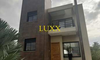 Imagem: CASA À VENDA COM 3 SUÍTES - COND. HARAS