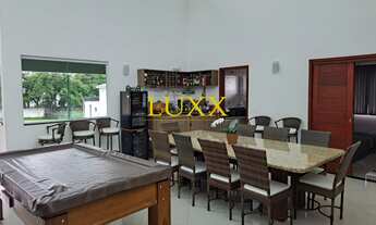 Imagem: CASA À VENDA COM 3 SUÍTES - COND. HARAS