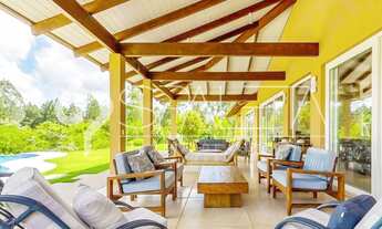 Imagem 5: Mansão com arquitetura litorânea e total conexão com a natureza à venda no Terras de São J