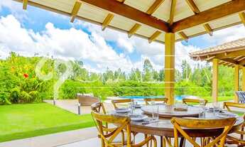 Imagem 6: Mansão com arquitetura litorânea e total conexão com a natureza à venda no Terras de São J