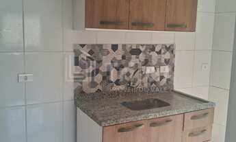 Imagem 2: Apartamento de 2 dormitórios no térreo com 1 vaga de garagem