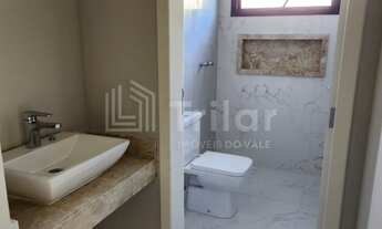 Imagem 2: Uma casa térrea aconchegante em condomínio fechado com 4 dormitórios e 2 suítes