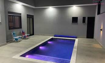 Imagem 2: Casa com 3 suítes, sendo 1 master, 198 m2, escritório, piscina aquecida, móveis planejados