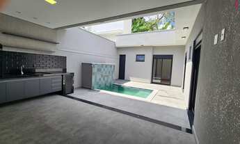 Imagem 4: Casa Térrea em Condomínio, com 3 suítes sendo 1 com closet com piscina