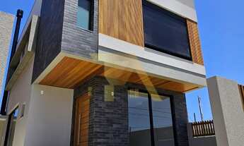 Imagem: Casa moderna com 3 quartos, rooftop e acabamentos