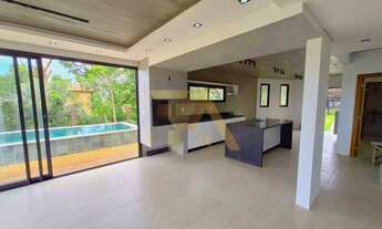 Imagem 2: Casa Nova com Piscina de Borda Infinita e 2 Suítes