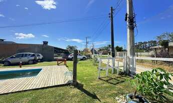 Imagem 4: Casa à venda em Imbituba-SC: 1 quarto, 1 sala, 1 banheiro, 4 vagas, com um amplo terreno d