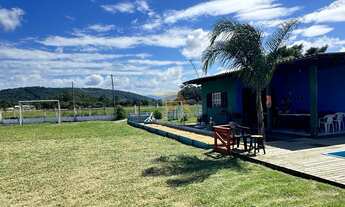 Imagem 5: Casa à venda em Imbituba-SC: 1 quarto, 1 sala, 1 banheiro, 4 vagas, com um amplo terreno d