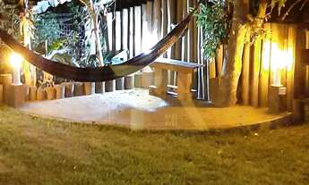 Imagem 4: Pousada com cabanas e casa principal na Praia do Rosa