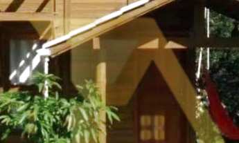 Imagem 7: Pousada com cabanas e casa principal na Praia do Rosa