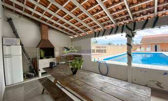 Imagem 3: Casa à venda de 4 quartos, 4 suítes, 3 salas, 5 banheiros, 8 vagas de garagem, piscina eno