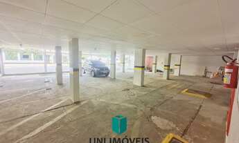 Imagem 7: Oportunidade na Praia do Morro! 2 quartos com área lateral e garagem na Avenida Paris