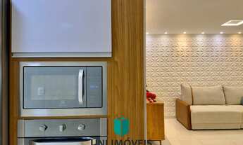 Imagem 5: Triplex à venda em bairro nobre de Guarapari com área gourmet e deck para lagoa