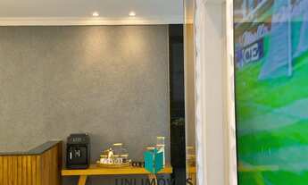 Imagem 6: Triplex à venda em bairro nobre de Guarapari com área gourmet e deck para lagoa