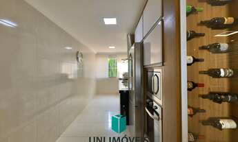 Imagem 3: Triplex à venda em bairro nobre de Guarapari com área gourmet e deck para lagoa