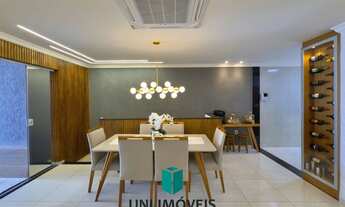 Imagem 2: Triplex à venda em bairro nobre de Guarapari com área gourmet e deck para lagoa