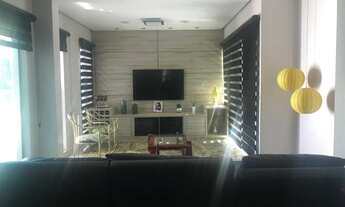 Imagem 3: CASA COM 4 SUÍTES NA RUA 01 JOCKEY, CONDOMÍNIO FECHADO COM PORTARIA 24 HORAS, LOTE QUITADO