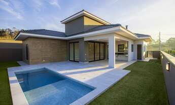 Imagem 3: Casa de luxo em condomínio: 4 quartos, 4 suítes, 3 salas, 5 banheiros, 6 vagas de garagem