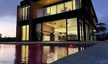 Imagem: Casa em condomínio 400m² 4 suítes, a