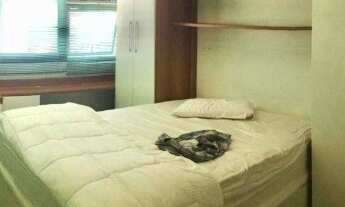 Imagem 2: Apartamento à venda na Barra da Tijuca - RJ com 2 quartos, 1 suíte e vista parcial do mar