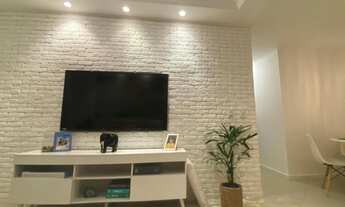 Imagem 6: Apartamento à venda na Barra da Tijuca - RJ com 2 quartos, 1 suíte e vista parcial do mar