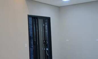 Imagem 7: Sala pé direito Alto 3,90 mts Cozinha com Cooktop Três dormitórios, uma suite cor AR CON