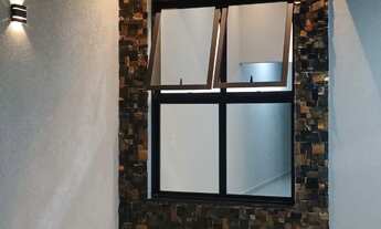 Imagem 4: Sala pé direito Alto 3,90 mts Cozinha com Cooktop Três dormitórios, uma suite cor AR CON