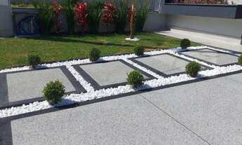 Imagem 2: Casa com 3 Suítes(sendo 1 suíte master com closet), Lavabo, Sala 2 ambientes com pé direit