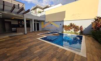 Imagem 6: Casa de alto padrão em condomínio: 3 quartos, 3 suítes, 3 salas, 5 banheiros, 4 vagas, 289