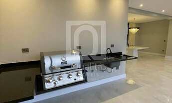 Imagem 6: Casa nova à vendo no Alphaville com piscina de borda infinita e área gourmet