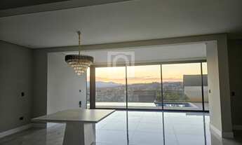 Imagem 3: Casa nova à vendo no Alphaville com piscina de borda infinita e área gourmet