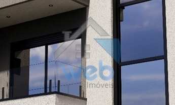 Imagem 2: Sobrado de alto padrão em condomínio à venda no Bairro Hauer, com três quartos, sala, cozi