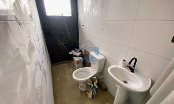 Imagem 6: Casa à venda no Bairro Tatuquara, próximo à Rua Enette Dubard, com três quartos. sala ampl