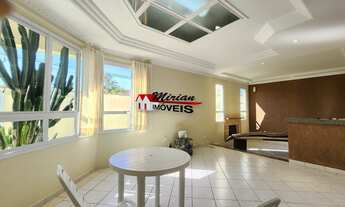 Imagem 2: Casa a venda em Peruibe, sala ampla com 3 dormitórios lareira Parque Turitisco