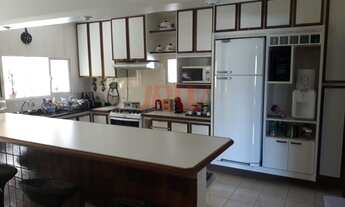 Imagem 3: Casa com 4 quartos sendo 03 com suíte e 5 banheiros à venda, com uma área de 380 m², por a