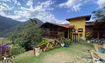 Imagem 2: Cada de madeira com 3 quartos sendo 1 suíte em condomínio em Sebastiana - Teresópolis/RJ