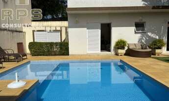 Imagem 2: Casa térrea no Condomínio Shambala 2 com 3 suítes, sala de estar e lareira, cozinha integr